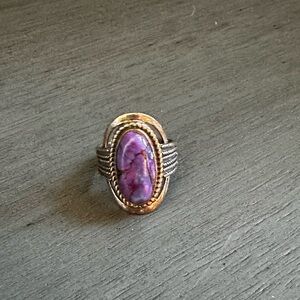Sterling silver ring with natural purple stone